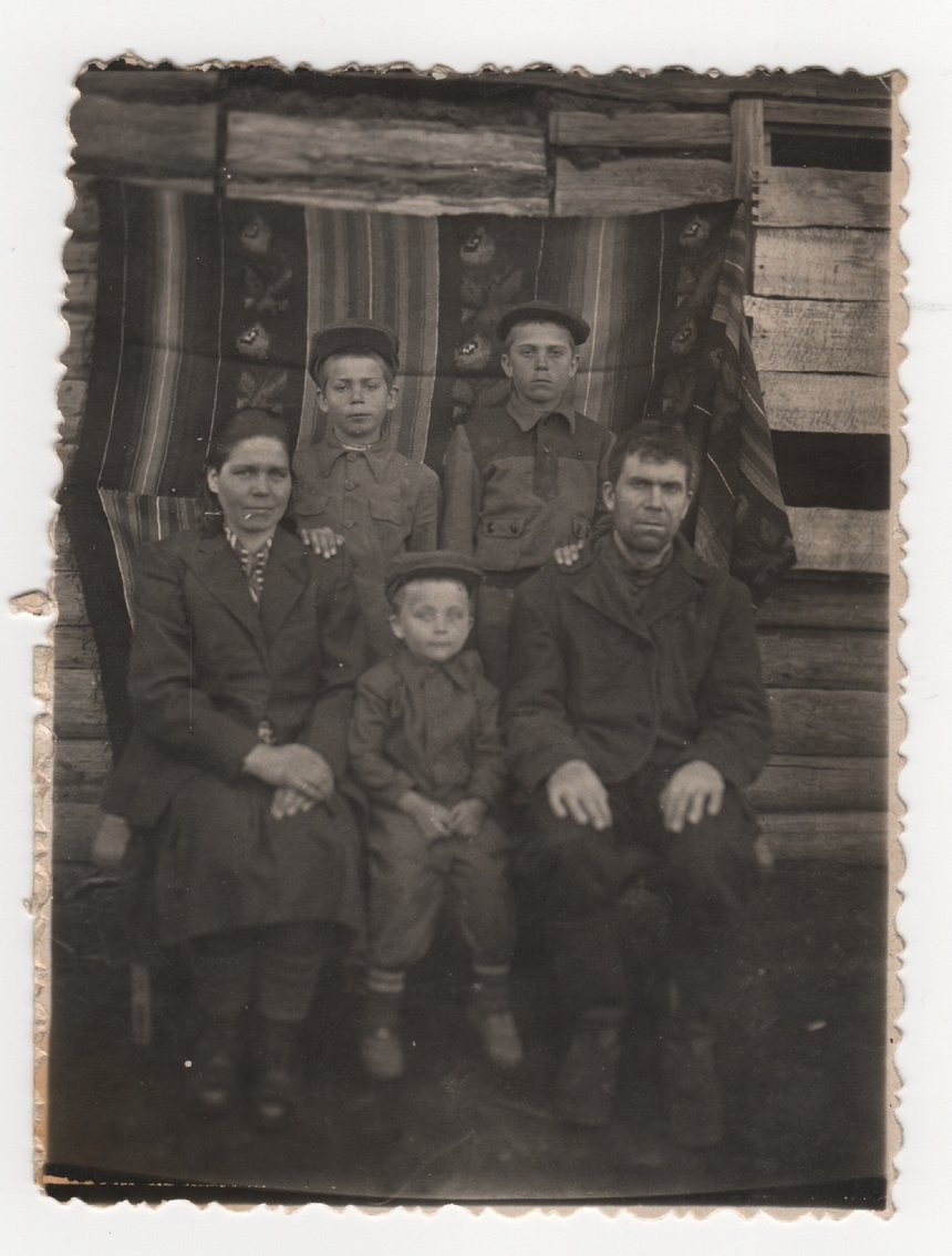 Aleksandr Ursu (front row, center) in exile with his family.